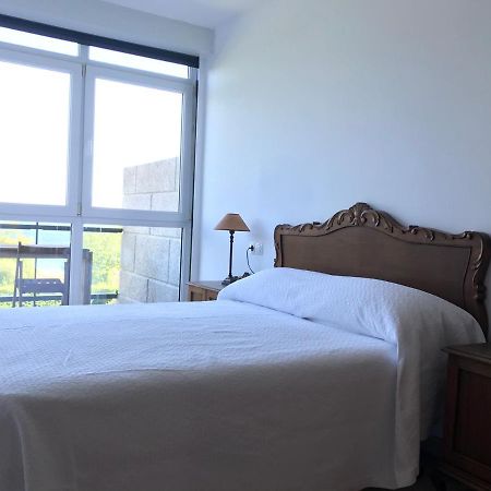 Apartamento con terraza primera linea de playa Finisterre Esterno foto