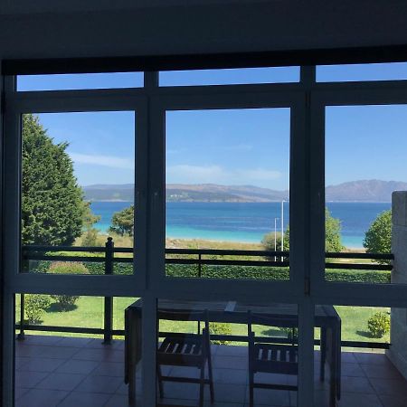 Apartamento con terraza primera linea de playa Finisterre Esterno foto